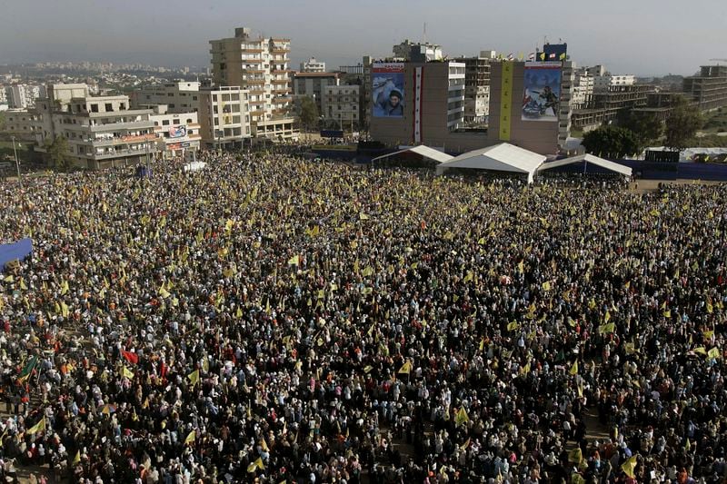 FILE - Hezbollah supporters gather in the southern port city of Tyre, Lebanon, on May 25, 2006, to mark the sixth anniversary of Israel's withdrawal from southern Lebanon after an 18-year occupation. (AP Photo/Hussein Malla, File)