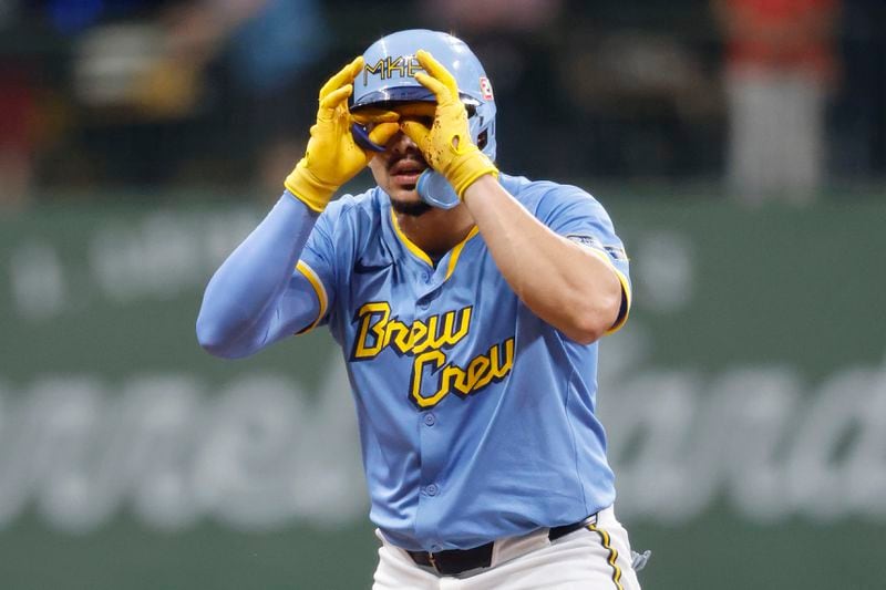 Milwaukee Brewers' Willy Adames reacts after hitting a double during the seventh inning of a baseball game against the Cleveland Guardians, Saturday, Aug. 17, 2024, in Milwaukee. (AP Photo/Jeffrey Phelps)