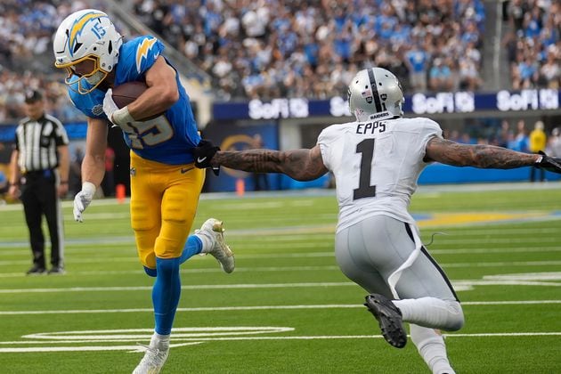 Los Angeles Chargers wide receiver Ladd McConkey (15) runs toward the end zone to score against Las Vegas Raiders safety Marcus Epps (1) during the second half of an NFL football game, Sunday, Sept. 8, 2024, in Inglewood, Calif. (AP Photo/Marcio Jose Sanchez)