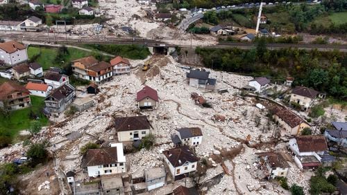 An aerial view shows the area destroyed by a landslide in Donja Jablanica, Bosnia, Saturday, Oct. 5, 2024. (AP Photo/Armin Durgut)