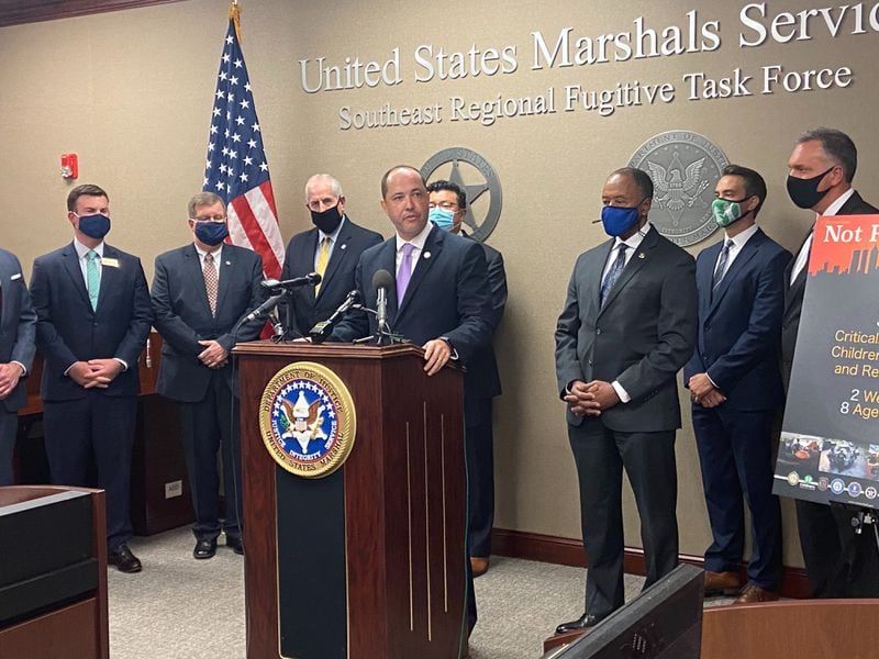 Georgia Attorney General Chris Carr speaks to reporters in August during the public announcement that Operation Not Forgotten, a joint law enforcement effort led by the U.S. Marshals Service, had recovered 39 missing and endangered children, ages 3 to 17. (Shaddi Abusaid / Shaddi.Abusaid@ajc.com)