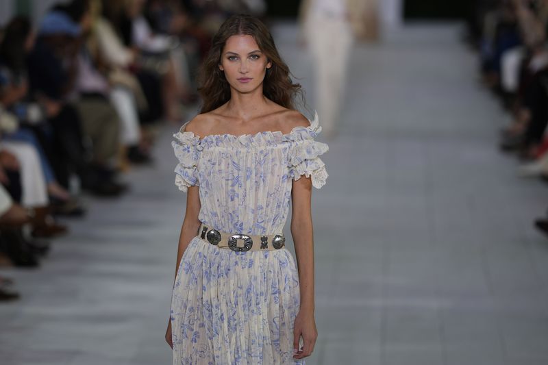 A model walks the runway during the Ralph Lauren Spring/Summer 2025 fashion show as part of New York Fashion Week on Thursday, Sept. 5, 2024, at Khalily Stables in Bridgehampton, N.Y. (Photo by Charles Sykes/Invision/AP)