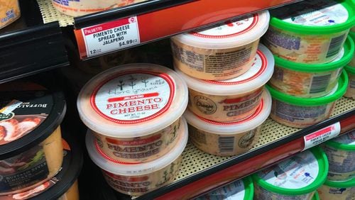 Home Grown’s packaged pimento cheese is shown on the shelves of a Kroger grocery store.