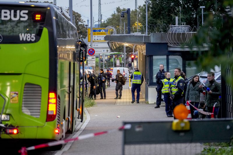 German police officers stop a bus at the border between Germany and France in Kohl, Germany, Monday, Sept. 16, 2024 as Germany controls all his borders from Monday on. (AP Photo/Michael Probst)