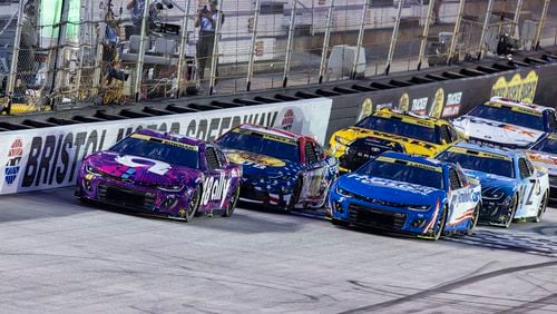 Alex Bowman (48) leads Kyle Larson (5) and Martin Truex Jr. (19) at the start of a NASCAR Cup Series auto race, Saturday, Sept. 21, 2024, in Bristol, Tenn. (AP Photo/Wade Payne)