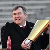 Georgia's head coach Kirby Smart holds the National Championship trophy during the celebration of the Bulldogs going back-to-back to win the 2022 National Championship at Sanford Stadium, Saturday, Jan. 14, 2023, in Athens. (Hyosub Shin / Hyosub.Shin@ajc.com)