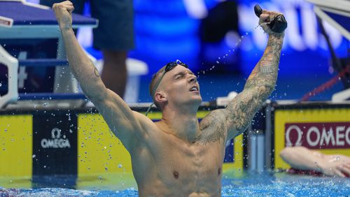 Caeleb Dressel reacts after winning the Men's 100 butterfly finals Saturday, June 22, 2024, at the US Swimming Olympic Trials in Indianapolis. (AP Photo/Michael Conroy)