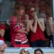 Taylor Swift is seen in a suite during the first half of an NFL football game between the Kansas City Chiefs and the Cincinnati Bengals Sunday, Sept. 15, 2024, in Kansas City, Mo. (AP Photo/Charlie Riedel)