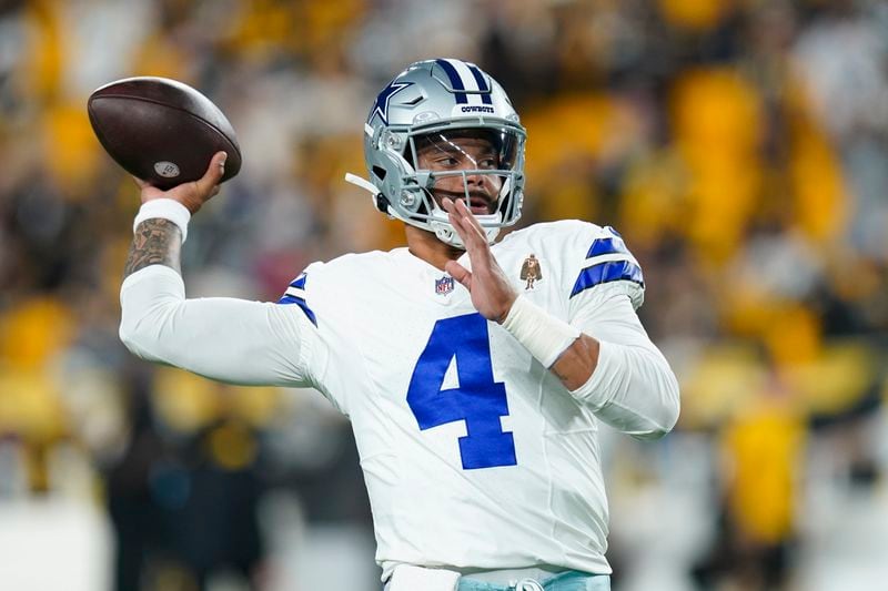 Dallas Cowboys quarterback Dak Prescott works out prior to an NFL football game against the Pittsburgh Steelers, Sunday, Oct. 6, 2024, in Pittsburgh. (AP Photo/Matt Freed)