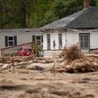 Homes lie in a debris field in the aftermath of Hurricane Helene, Thursday, Oct. 3, 2024, in Pensacola, N.C. (AP Photo/Mike Stewart)