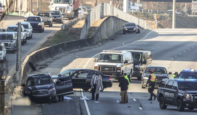 January 14, 2021 Atlanta:  A man was shot to death inside a car on I-85 in DeKalb County on Thursday morning, Jan. 21, 2021 prompting an investigation that closed the interstate for hours. Gunfire from the incident also damaged a nearby Children’s Healthcare of Atlanta building, officials said. John Spink / jspink@ajc.com