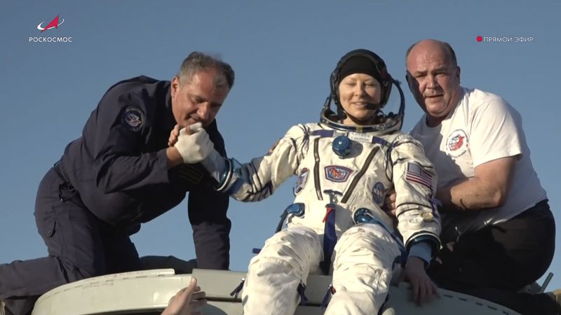 In this photo taken from video released by Roscosmos space corporation, rescue team members help NASA astronaut Tracy Dyson to leave the capsule shortly after the landing of the Russian Soyuz MS-25 space capsule carrying the NASA astronaut Tracy Dyson and the Roscosmos cosmonauts Oleg Kononenko and Nikolai Chub, south-east of the Kazakh town of Zhezkazgan, Kazakhstan, Monday, Sept. 23, 2024. (Roscosmos space corporation via AP)