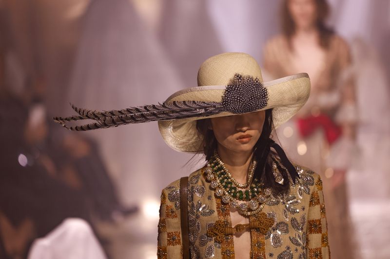 A model wears a creation as part of the Valentino Spring/Summer 2025 collection presented Sunday, Sept. 29, 2024 in Paris. (Photo by Vianney Le Caer/Invision/AP)