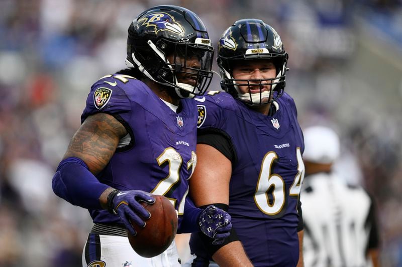 Baltimore Ravens running back Derrick Henry (22) celebrates after scoring a touchdown against the Las Vegas Raiders during the second half of an NFL football game, Sunday, Sept. 15, 2024, in Baltimore. (AP Photo/Nick Wass)