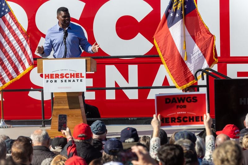 U.S. Senate hopeful Herschel Walker talks to the crowd during a Smyrna rally  on Nov. 19, 2022.  (Steve Schaefer/AJC)