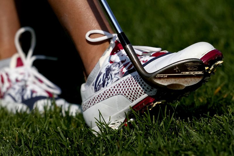 United States' Lexi Thompson wears shoes with her likeness on them during a practice round prior to the Solheim Cup golf tournament at the Robert Trent Jones Golf Club, Wednesday, Sept. 11, 2024, in Gainesville, VA. (AP Photo/Matt York)