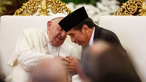 Pope Francis, left, and Indonesian President Joko Widodo attend a meeting with Indonesian authorities, civil society and the diplomatic corps, during his apostolic visit to Asia, at the Presidential Palace in Jakarta Wednesday, Sept. 4, 2024. (Willy Kurniawan/Pool Photo via AP)