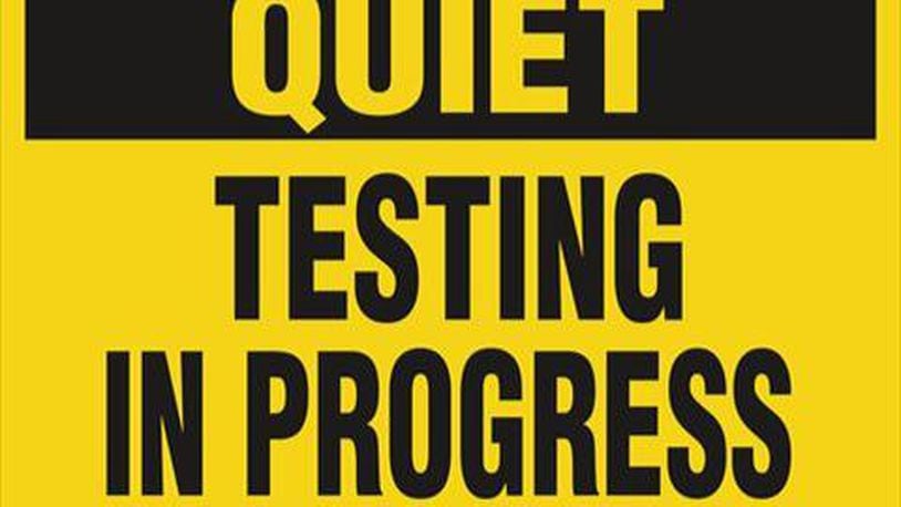 taking test quiet sign