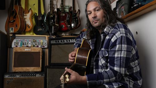 Adam Granduciel, leader of the band The War on Drugs, poses for a portrait at his studio on Monday, Aug. 26, 2024, in Burbank, Calif. (AP Photo/Chris Pizzello)