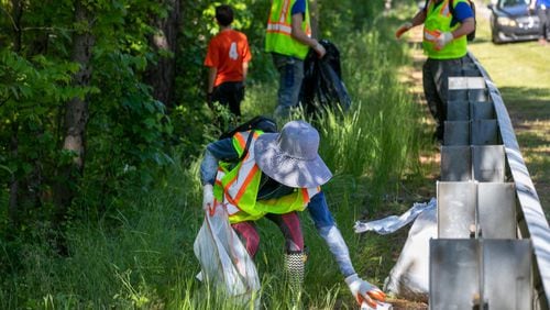 Gwinnett Clean & Beautiful volunteers engage in a roadside cleanup to address litter. (Courtesy Gwinnett Clean & Beautiful)