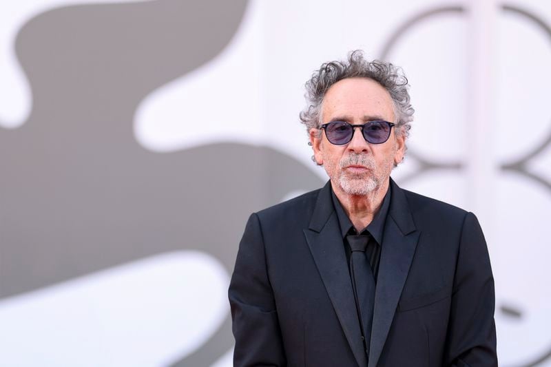 Director Tim Burton poses for photographers upon arrival for the premiere of the film 'Beetlejuice Beetlejuice' and the opening ceremony of the 81st edition of the Venice Film Festival in Venice, Italy, on Wednesday, Aug. 28, 2024. (Photo by Vianney Le Caer/Invision/AP)