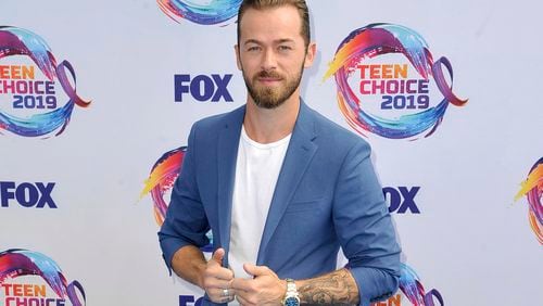 FILE - Artem Chigvintsev arrives at the Teen Choice Awards on Sunday, Aug. 11, 2019, in Hermosa Beach, Calif. (Photo by Richard Shotwell/Invision/AP, File)