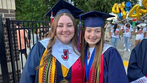 Jackson High School Salutatorian Camdyn Glover (left) and Valedictorian Taylor Newnan used Taylor Swift lyrics in their addresses to encourage their classmates. (Photo Courtesy of Sharon Dowdy Cruse)