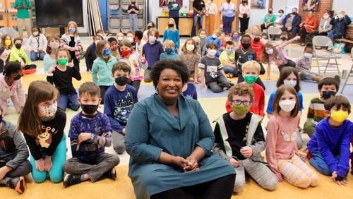 An image of Stacey Abrams with a group of students in Decatur that was in a now-deleted tweet.