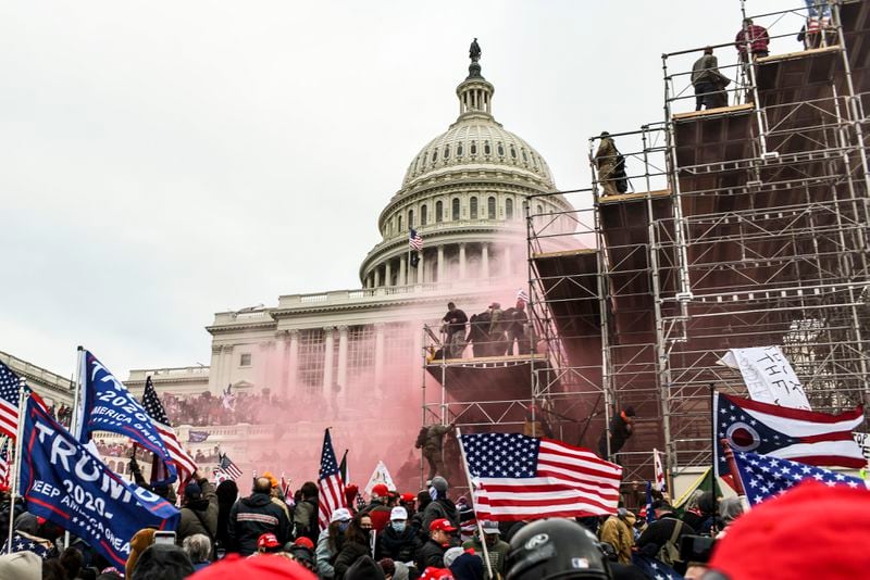 In this file photo, rioters incited by then-President Donald Trump breach the Capitol building in Washington, on Jan 6, 2021. At a campaign event today in Pennsylvania, President Joe Biden will mark the three-year anniversary of the Jan. 6 attack and outline threats to democracy. (Kenny Holston/The New York Times)
                      