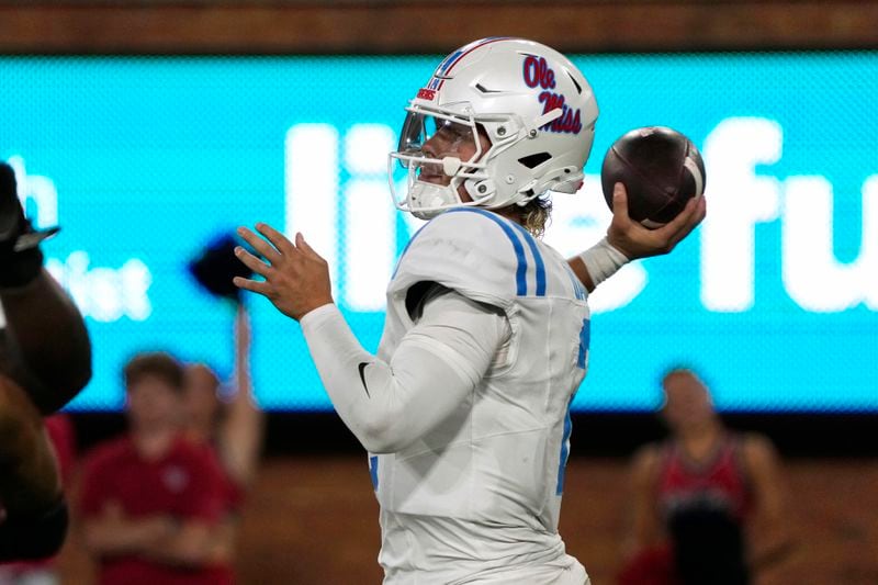 Mississippi quarterback Jaxson Dart (2) looks to pass against Wake Forest during the second half of an NCAA college football game in Winston-Salem, N.C., Saturday, Sept. 14, 2024. (AP Photo/Chuck Burton)