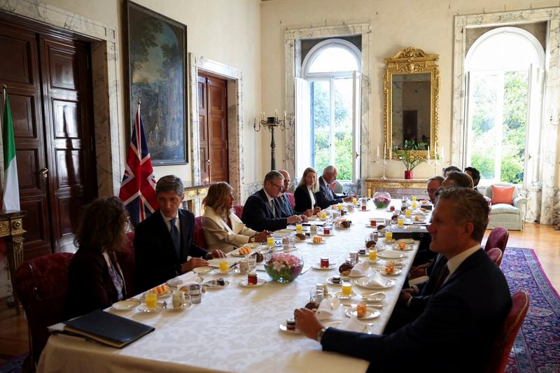 British Prime Minister Keir Starmer, fourth left, attends a breakfast meeting with Italian business leaders at Villa Wolkonsky in Rome, Italy, Monday, Sept. 16, 2024. (Phil Noble/Pool Photo via AP)