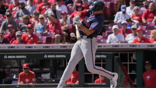 Atlanta Braves' Matt Olson hits a solo home run during the second inning of a baseball game against the Cincinnati Reds, Thursday, Sept. 19, 2024, in Cincinnati. (AP Photo/Joshua A. Bickel)