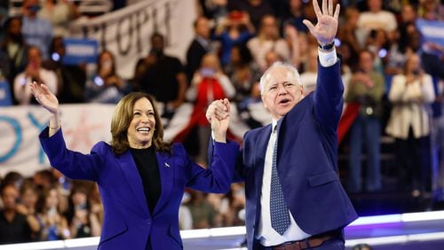  Vice President Kamala Harris and her running mate  Tim Walz wave to their supporters after her speech during a rally campaign at the Fiserv Forum in Milwaukee on Tuesday, August 20, 2024.
(Miguel Martinez / AJC)