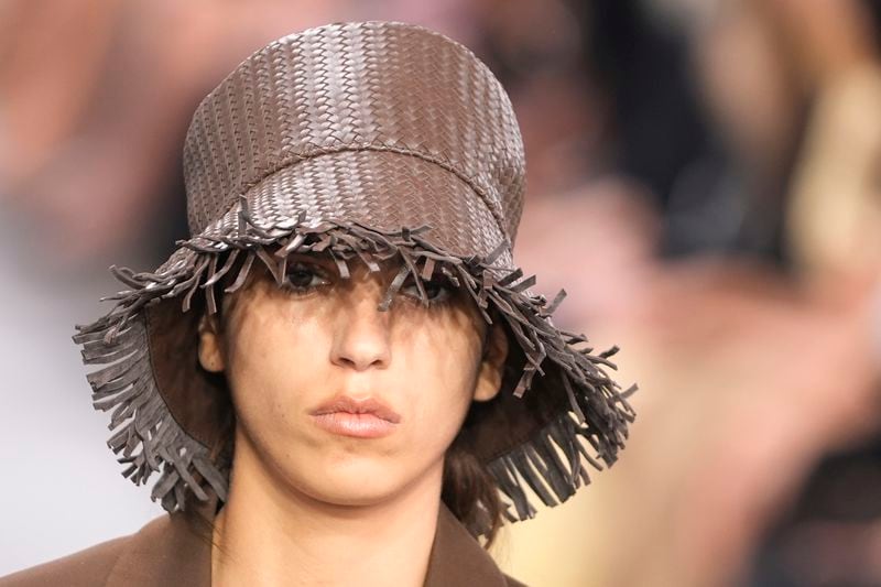 A model walks the runway during the Michael Kors Collection spring/summer 2025 fashion show as part of New York Fashion Week, Tuesday, Sept. 10, 2024, in New York. (AP Photo/Pamela Smith)