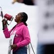 Striking longshoreman Teresa Whitte, of New York, pickets outside the Packer Avenue Marine Terminal Port, Tuesday, Oct. 1, 2024, in Philadelphia. (AP Photo/Matt Slocum)