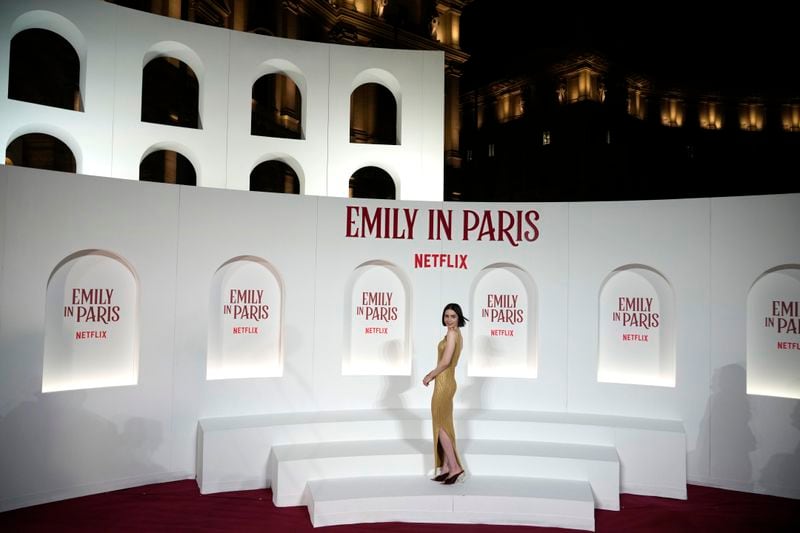 Actress Lily Collins arrives at the premiere of "Emily in Paris", in Rome, Tuesday, Sept. 10, 2024. (AP Photo/Andrew Medichini)