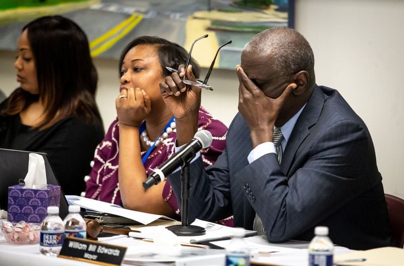 Mayor Bill Edwards reacts during a hearing to remove Edwards and councilwoman Helen Zenobia Willis (R) from office at the South Fulton City Hall, Dec. 30, 2019. STEVE SCHAEFER / SPECIAL TO THE AJC