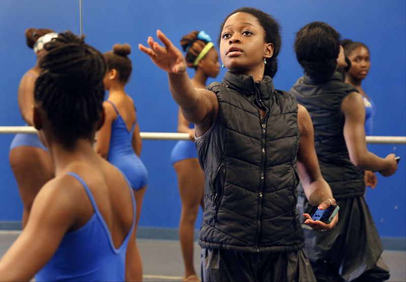 Michaela DePrince, center, instructs intermediate ballet students at BE Dance Studios in Miami Gardens, Fla. on July 14, 2015. (Carl Juste/Miami Herald via AP, File)