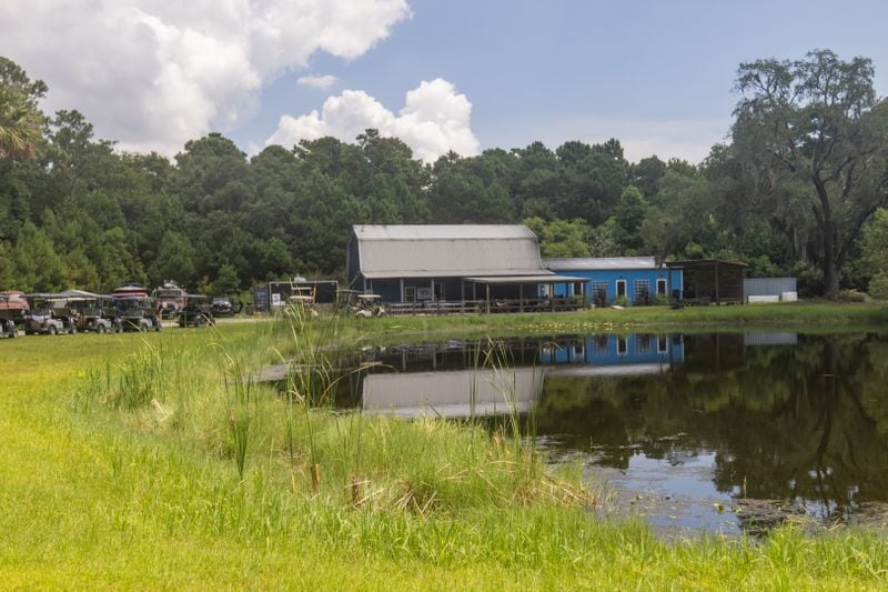 The dining area for On-Deck Diner overlooks a freshwater pond popular with local wildlife, including alligators. (AJC Photo/Katelyn Myrick)