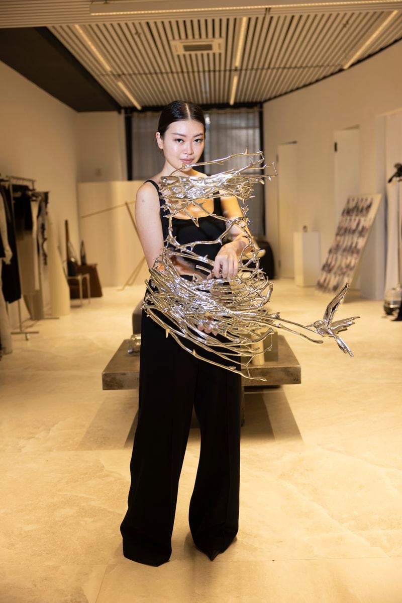 Singapore designer Grace Ling displays 3D printed designs from her New York Fashion Week collection on Friday, Sept. 13, 2024, in New York. Ling is one of ten designers competing in the 2024 CFDA/Vogue Fashion Fund. (Photo by Matt Licari/Invision/AP)