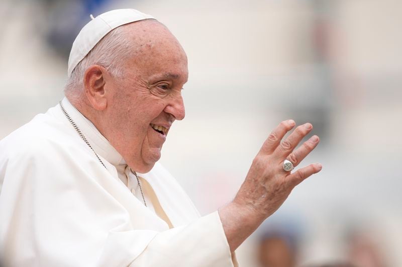 Pope Francis leaves at the end of his weekly general audience in St. Peter's Square, at the Vatican, Wednesday, Sept. 18, 2024. (AP Photo/Andrew Medichini)