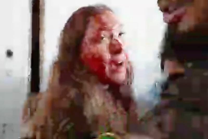 This image taken from video provided by the Hostage Families Forum, shows a bloodied Israeli female soldier from the Nahal Oz military base after she was taken captive by Hamas on Oct. 7, 2023. The footage was taken by Hamas militants who stormed the Nahal Oz military base, part of the militant group’s wider assault on southern Israel that killed roughly 1,200 people and took about 250 others hostage. (Hostage Families Forum via AP)