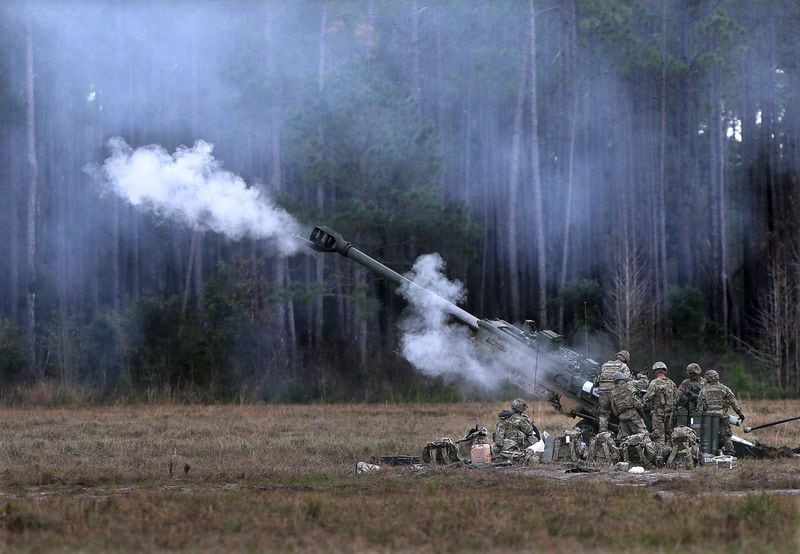 Members of the Georgia National Guard’s 1st Battalion of the 118th Field Artillery Regiment fire their howitzer during training at Fort Stewart ahead of their deployment next month to Afghanistan. Curtis Compton/ccompton@ajc.com