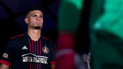 Atlanta United defender Miles Robinson (12) walks out onto the pitch before the match against Nashville Saturday, Aug. 28, 2021, at Mercedes-Benz Stadium in Atlanta. (Jacob Gonzalez/Atlanta United)