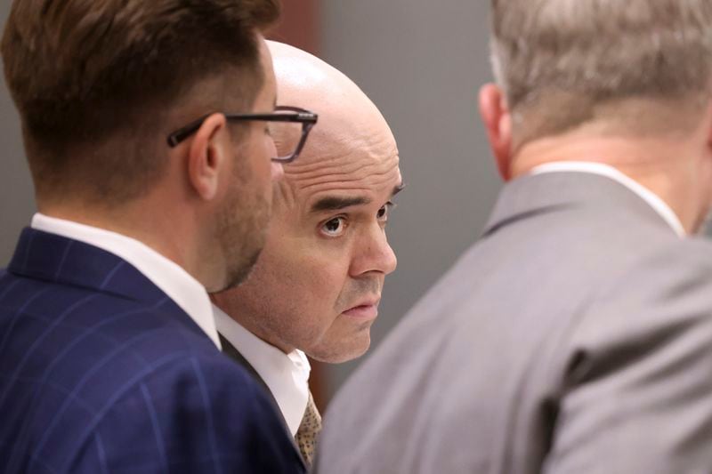 Robert Telles, center, listens in court with his attorneys Robert Draskovich, right, and Michael Horvath, prior to jury selection on the second day of his murder trial at the Regional Justice Center in Las Vegas Tuesday, Aug. 13, 2024. Telles, a former Clark County public administrator, is charged in the murder of Las Vegas Review-Journal investigative journalist Jeff German. (K.M. Cannon/Las Vegas Review-Journal via AP, Pool)