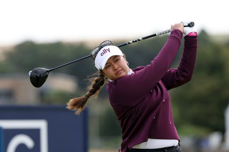 United States' Lilia Vu plays her tee shot from the 3rd tee during the first round of the Women's British Open golf championship, in St Andrews, Scotland Thursday, Aug. 22, 2024. (AP Photo/Scott Heppell)