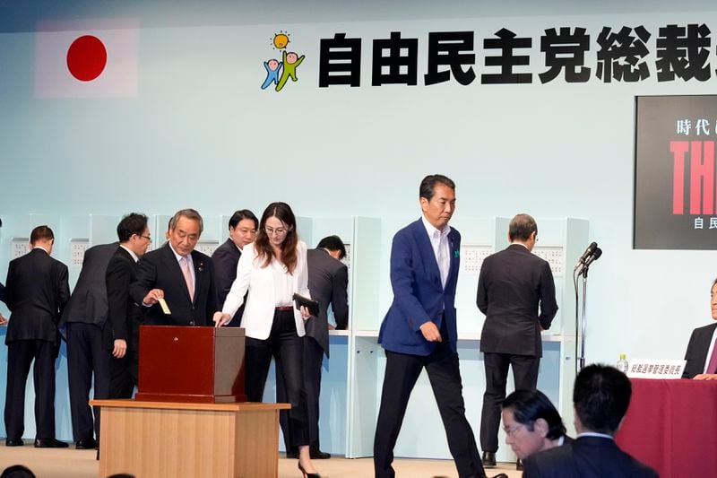 Party members cast their ballots at the Liberal Democratic Party's (LDP) leadership election Friday, Sept. 27, 2024, in Tokyo. (AP Photo/Hiro Komae, Pool)