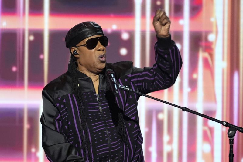 Stevie Wonder performs during the Democratic National Convention Wednesday, Aug. 21, 2024, in Chicago. (AP Photo/J. Scott Applewhite)