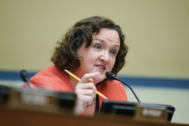 FILE- Rep. Katie Porter, D-Calif., speaks during a House Committee on Oversight and Reform hearing on gun violence on Capitol Hill in Washington, June 8, 2022. Bipartisan legislation introduced in the House would require presidents and vice presidents to publicly disclose tax returns before, during and after their time in the White House. The proposal — led by the unusual pairing of Republican Rep. James Comer and progressive Democratic Rep. Katie Porter — is the latest effort to deliver congressional oversight over presidential ethics as both parties grapple with ongoing congressional probes into their leading candidates for president. (AP Photo/Andrew Harnik, Pool, File)