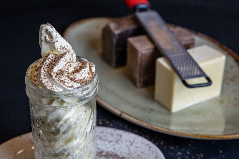 House-made vanilla soft-serve ice cream is served at Resto L'Antoinette with a shaving of white, milk or dark chocolate. (Courtesy of Resto L'Antoinette)